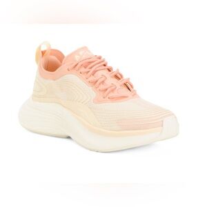 APL Pink and Cream Athletic Shoes with Modern Silhouette